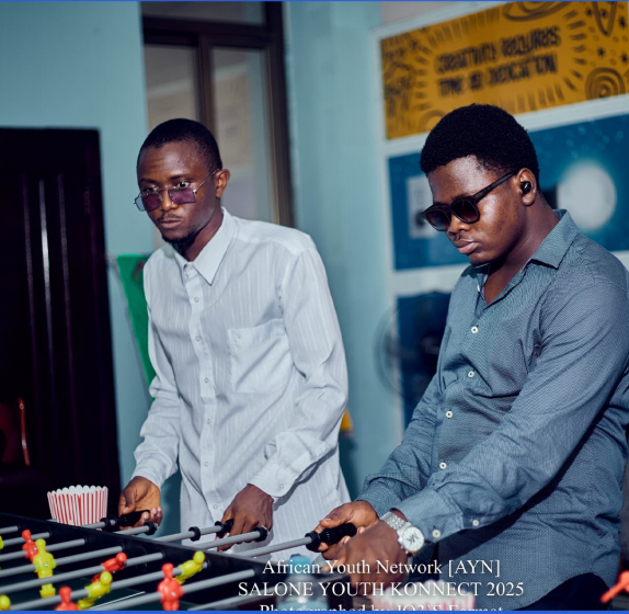 Two participants playing table football during the games session